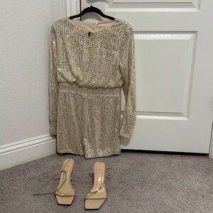 Size 10  Sequence romper. Champagnes gold. Worn just once for about 10 minutes